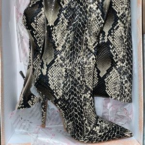 SOLD!!! Never worn! Snake skin thigh high boots!